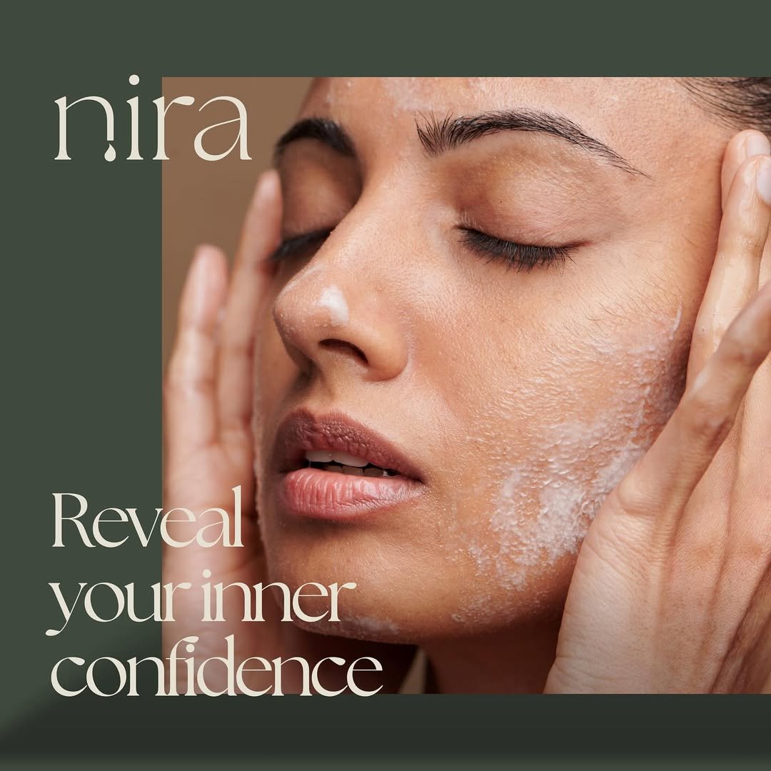 Nira — Reveal your inner confidence; portrait of a woman cleansing her face on sage green background